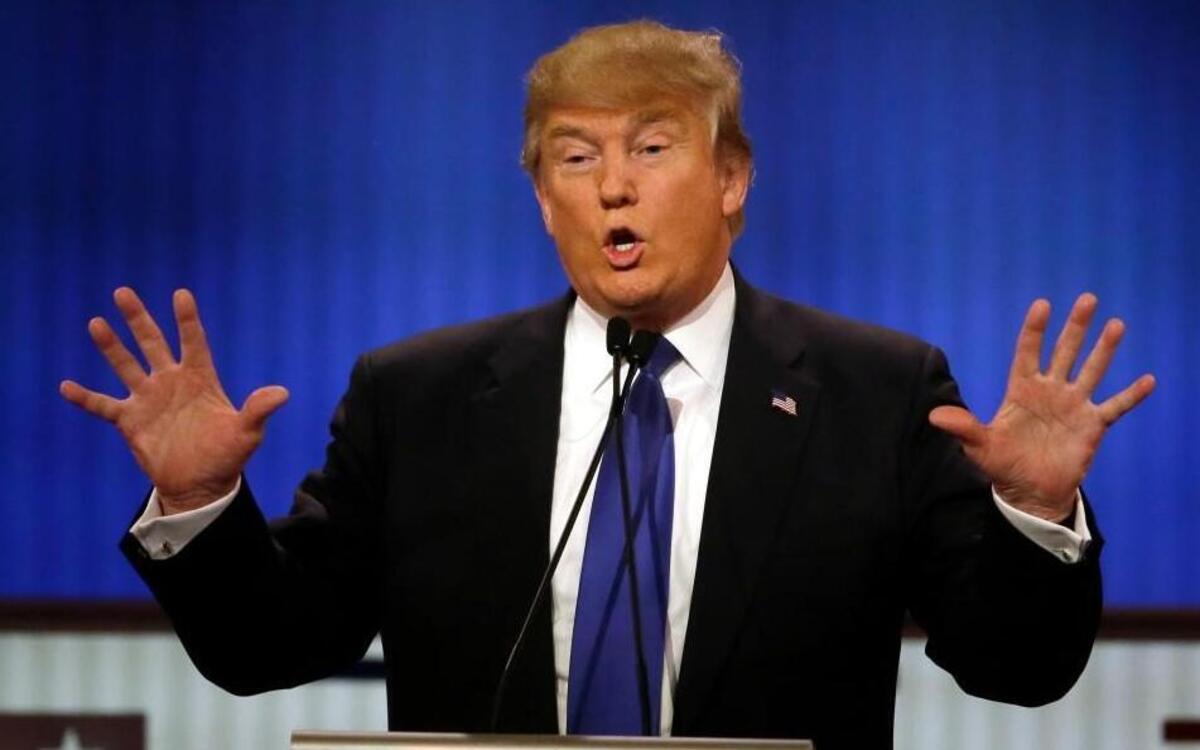 Republican presidential candidate, businessman Donald Trump speaks during a Republican presidential primary debate at Fox Theatre in Detroit.