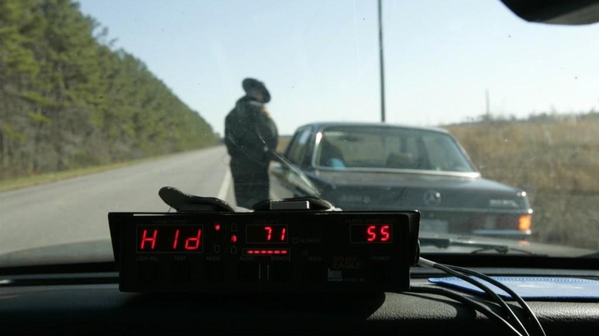 A North Carolina Highway Patrol trooper gives a driver a speeding ticket on U.S. 64.