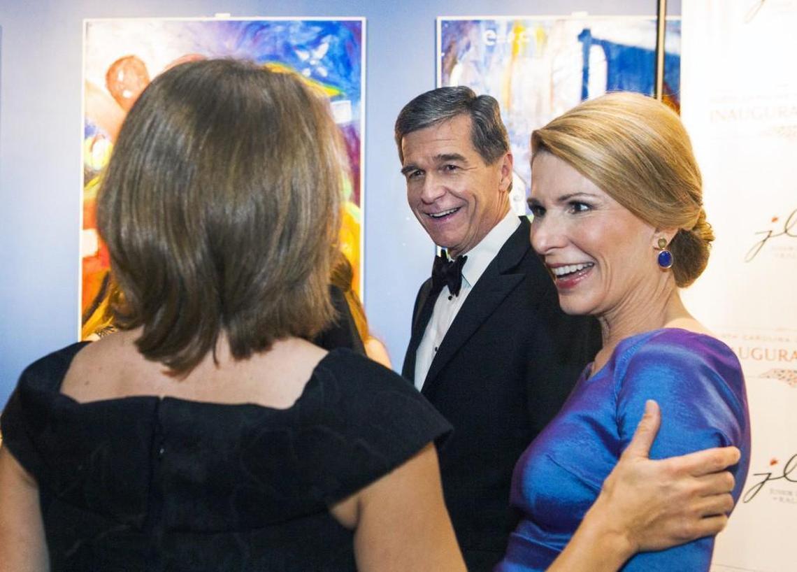 Governor Roy Cooper greets guests with First Lady Kristin Cooper shortly after arriving at Marbles Kids Museum for the North Carolina Governor’s Inaugural Ball on Friday Jan. 6, 2016 in Raleigh, NC. The event was held ahead of schedule due to winter weather expected to affect the state.