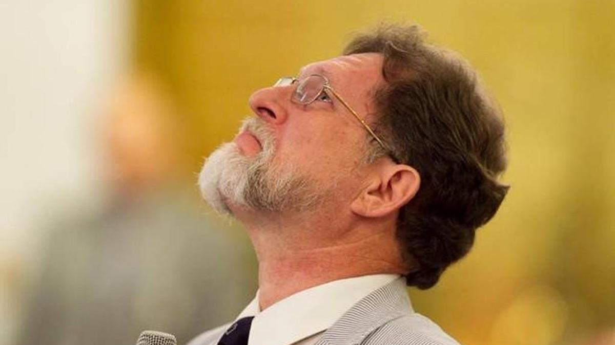 State Rep. Larry Pittman of Concord stares at the ceiling as he gathers himself in August 2014. In response to a school shooting in Florida on Feb. 14, 2018, Pittman on Feb. 15 encouraged a legislative committee to consider arming teachers in North Carolina.