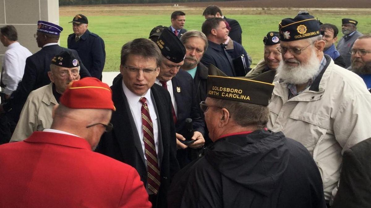 Then-Gov. Pat McCrory greets veterans after a dedication of the state’s newest veterans cemetery in Goldsboro in 2015.