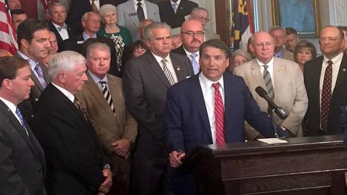 
Many North Carolina county and city officials stood with Gov. Pat McCrory at the Executive Mansion Tuesday June 30, 2015, in support of McCrory's bond plan "Connect NC," as Gov. McCrory urged the General Assembly to take action on it.
