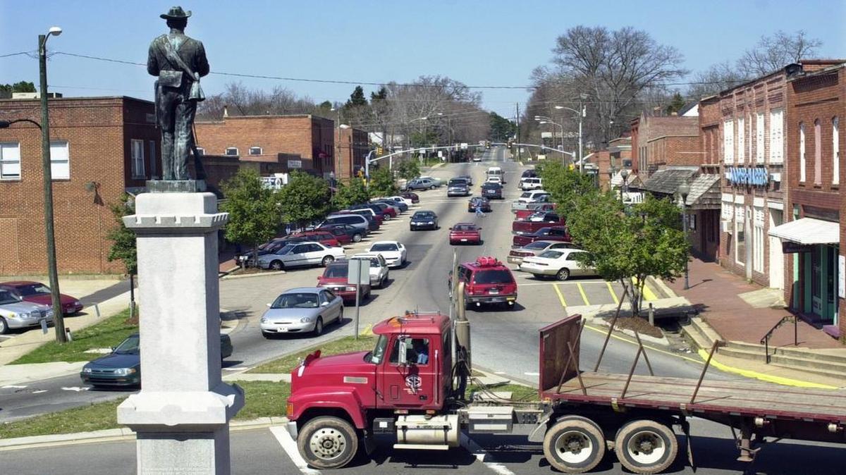 
A statue of a Confederate soldier looks north on Hillsboro Street from the traffic circle of downtown Pittsboro. Gov. Pat McCrory will sign a bill banning state agencies and local governments from removing monuments and other historical “objects of remembrance.”
