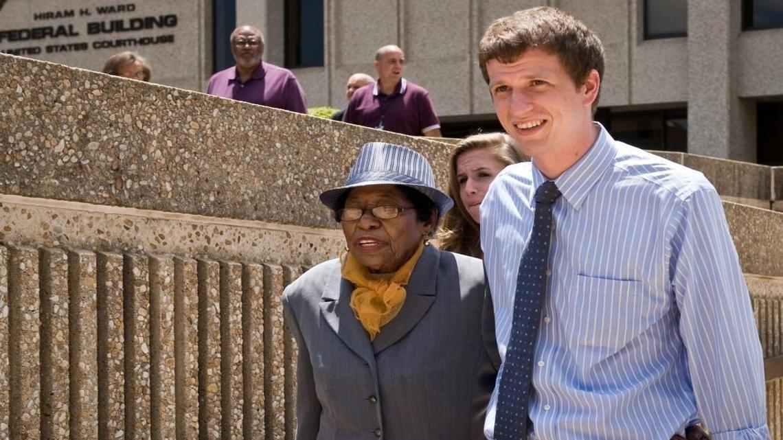 
Rob Stephens, with the N.C. NAACP, escorts Rosanell Eaton out of the Ward Federal building during lunch recess.
