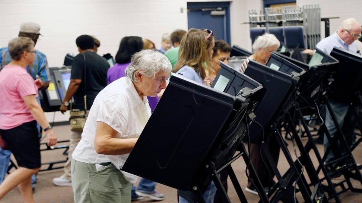 Voters fill the stations as hundreds came out on the first day of early voting at the Hope Mills Recreation Center in Hope Mills, NC on Oct. 20, 2016.