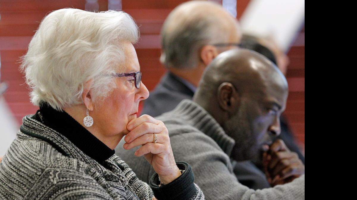 
Wake County Commissioner Betty Lou Ward, left, and Wake County School Board member Keith Sutton listen during a joint meeting between the Wake Co. Commissioners and the Wake Co. School Board held at PNC Arena in Raleigh on Jan. 26, 2015. Ward says she will not seek re-election after 28 years of service on the board.

