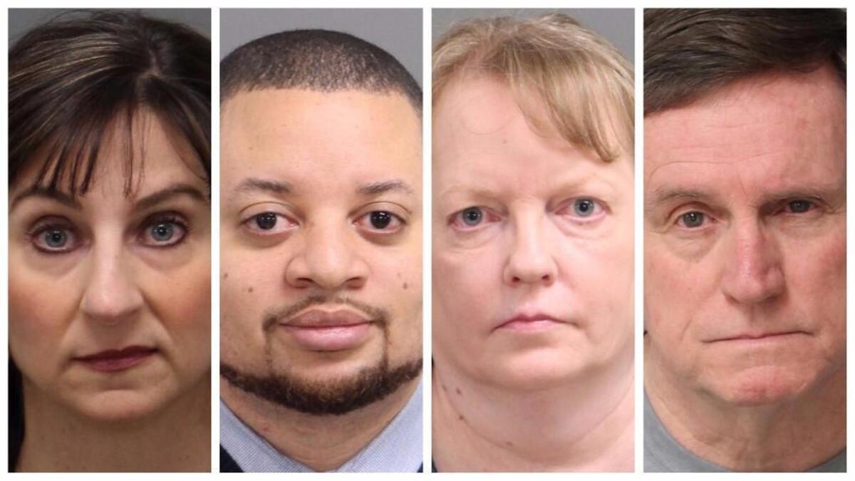 From left, former Wake County Register of Deeds Laura Riddick and former deeds employees Troy Ellis, Veronica Gearon and Murray Parker. All were indicted on embezzlement charges in December.