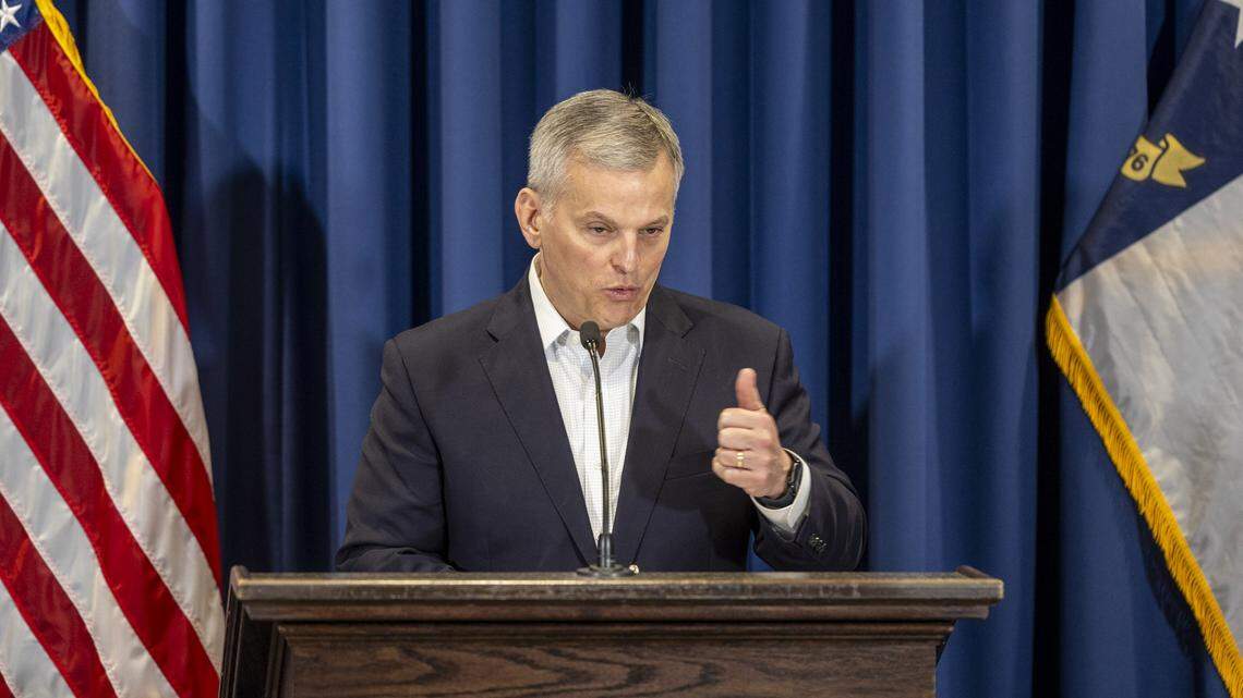 Gov. Josh Stein urges the General Assembly to spend $1.4 billion on what he calls “critical needs” to keep the state running during a news conference Monday, March 9, 2026, at the Albemarle Building in Raleigh. With the 2025 state budget still unresolved, Stein is seeking funds for teacher pay increases, raises for troopers and correctional officers and support for Medicaid.