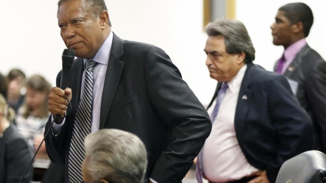
NC State Senator Dan Blue (D-Wake County), left, stands to plead for more time for senators to read the budget compromise bill before them in the NC Senate Tuesday as fellow State Senator Bob Rucho (R-Mecklenburg County) listens before coming back to his seat in the NC Senate. The NC Senate debated a motion to back the House/Senate budget compromise which was just released to the public the day before. The Senate voted 33 in favor of and 16 opposed to approve the motion setting up a final vote for the budget compromise on Wednesday.
