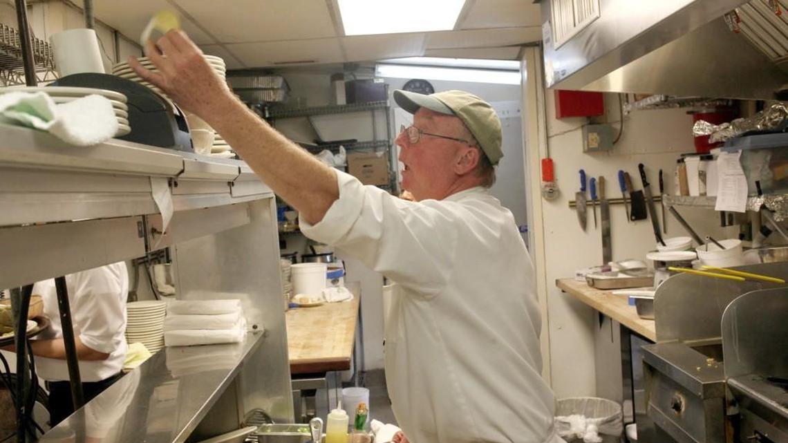 Bill Smith in the kitchen at Crook’s Corner in Chapel Hill in 2011. Smith has been with the restaurant since 1993.
