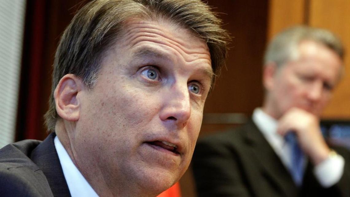 Gov. Pat McCrory, left, and Frank Perry, NC Secretary of Public Safety, right at a press conference in Raleigh on August 5, 2014.