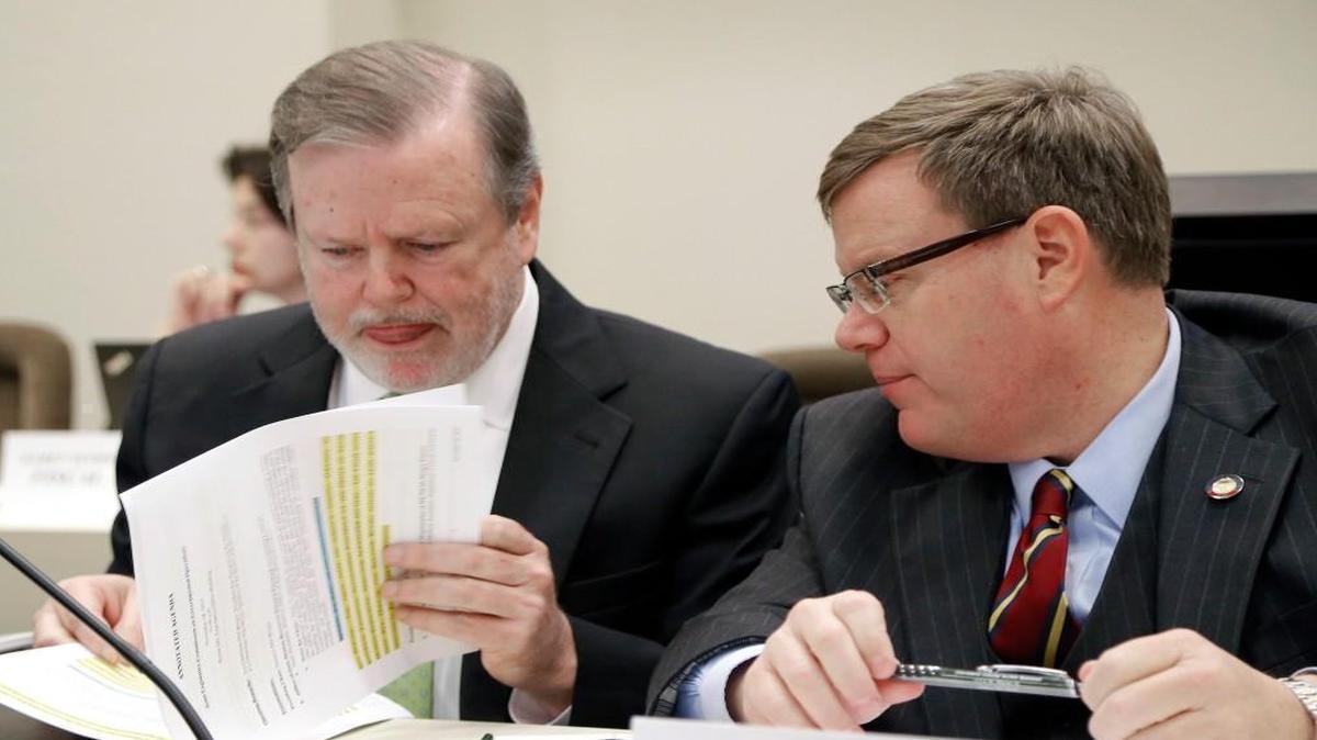Co-Chairs Sen. Phil Berger, President Pro Tempore NC Senate, left, and and Rep. Tim Moore, Speaker of the NC House confer before the start of the Joint Legislative Commission on Governmental Operations meets at the Legislative Office Building in Raleigh, NC on Nov. 18, 2015.