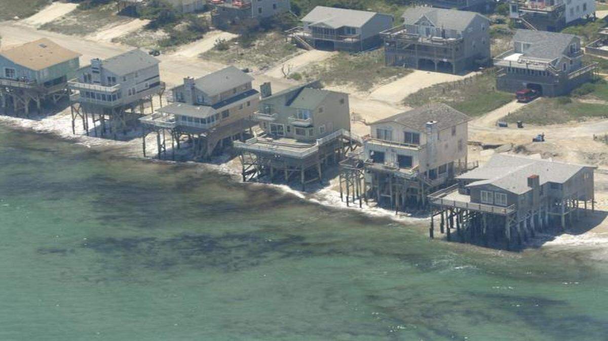 
2010 file – Rising sea levels threaten homes along the N.C. Outer Banks, such as these in Nags Head.
