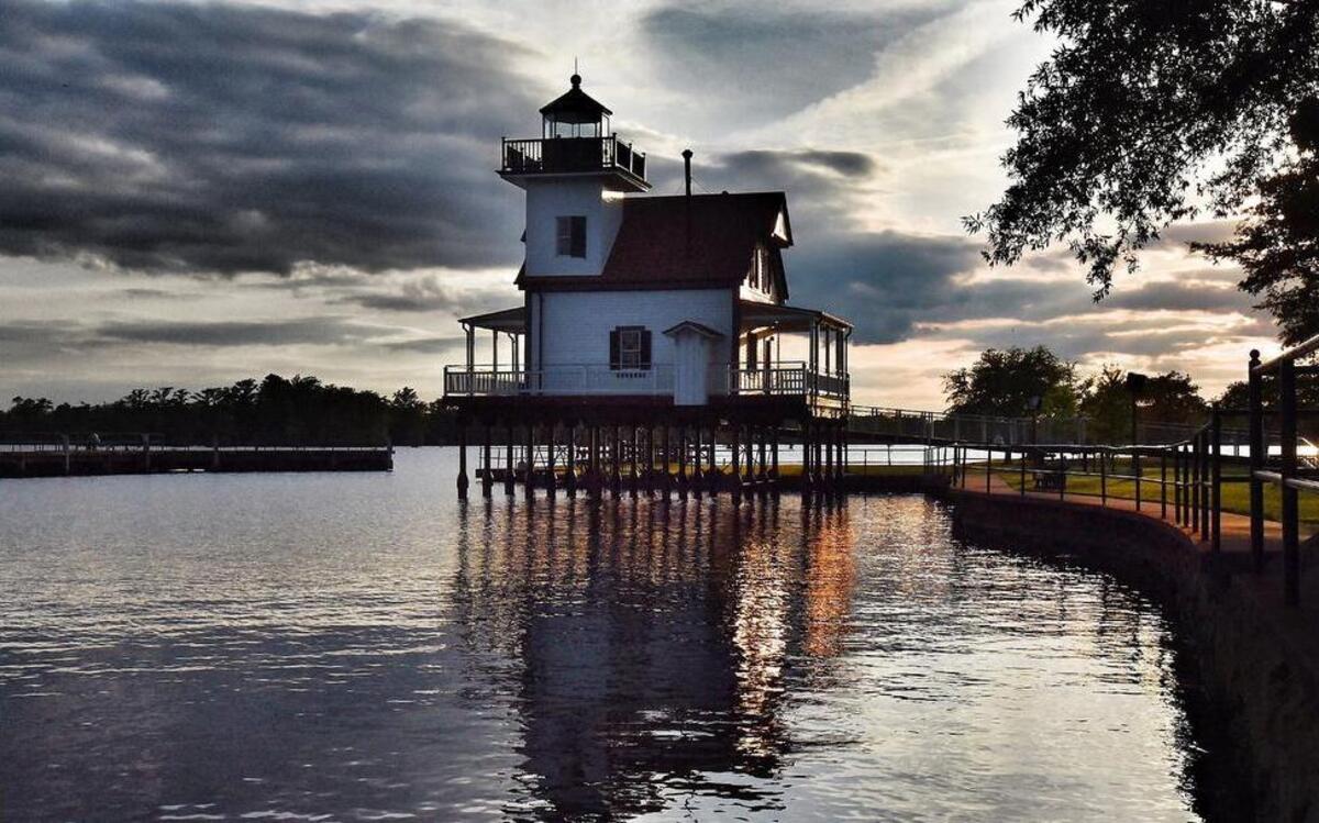 
The sun sets on the Roanoke River Lighthouse as it stands in the Harbor of Edenton  on May 14. The lighthouse, originally built in 1886, has been moved several times. It was renovated, then reopened to the public in August 2014.
