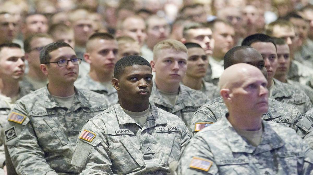 
Soldiers listen to speakers as a mobilization ceremony is held for over 300 North Carolina Army National Guard service members at Providence Baptist Church in Raleigh on Thursday.
