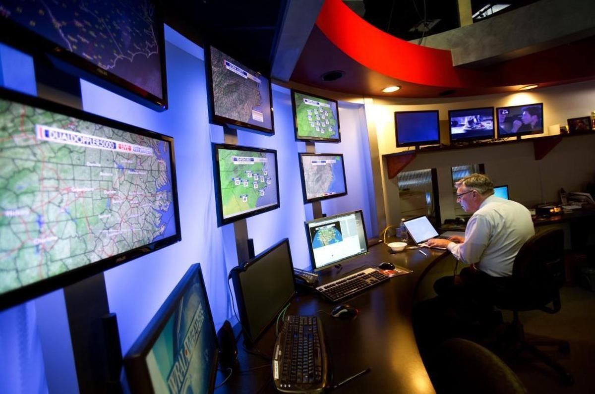 Meteorologist Greg Fishel gets right to work after arriving at WRAL at 1pm on Tuesday, December 8, 2015.