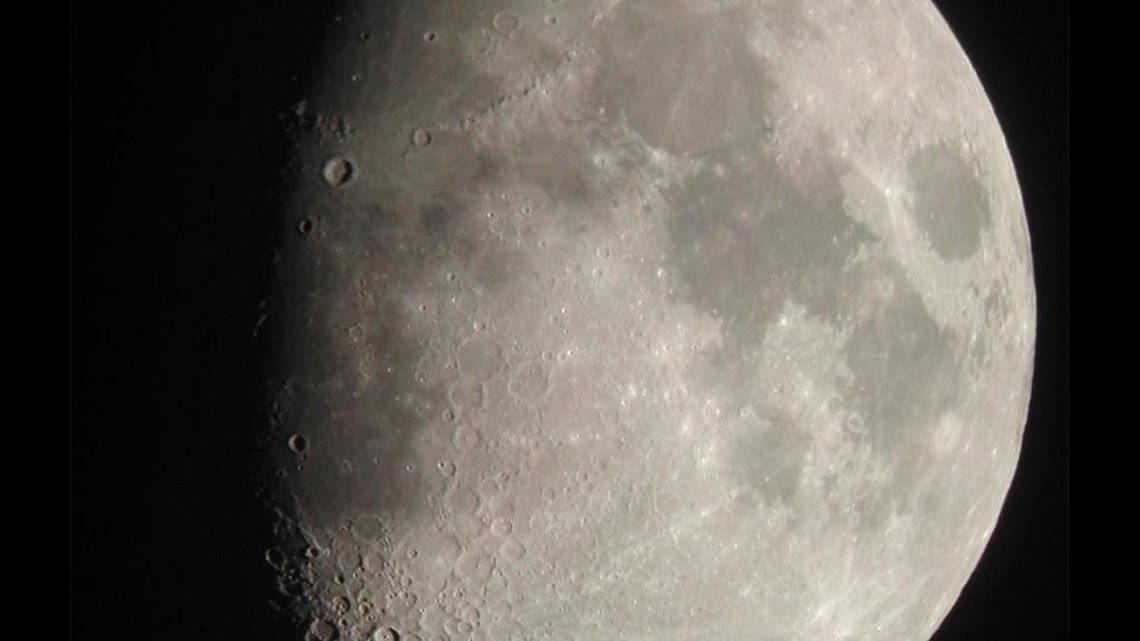 
The half-illuminated moon, often called a half moon, is a quarter of the way along its cycle from new moon (dark) to crescent moon to full moon (fully illuminated) and back again.
