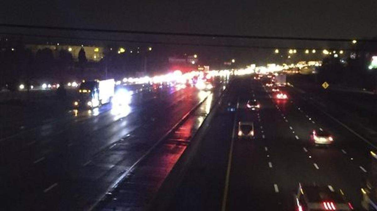 This photo provided by ABC11 shows traffic backing up on westbound Interstate 40 from the view of Exit 154 after multiple vehicle accidents Sunday, March 13, 2016, in central North Carolina. Authorities say dozens of vehicles were involved in a series of wrecks that injured over a dozen people and temporarily shut down part of Interstate 40.