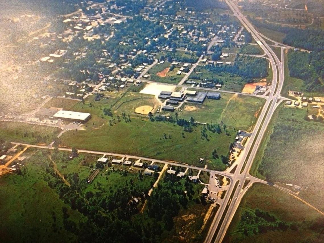 Remember this? This aerial photo from the 1970s shows what is now U.S. 70 Business when it was still a bypass around Clayton. That’s Clayton High School in the center, on South Fayetteville Street, with South Robertson Street in the foreground. This stretch of road is now mostly lined with businesses on both sides.