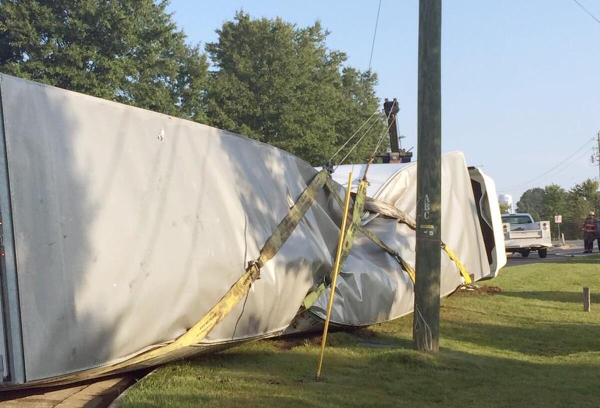 This photo shows where the overturned trailer buckled during attempts to lift it to turn it upright at U.S. 70 and Shotwell Road in Clayton Thursday, Sept. 21, 2017.