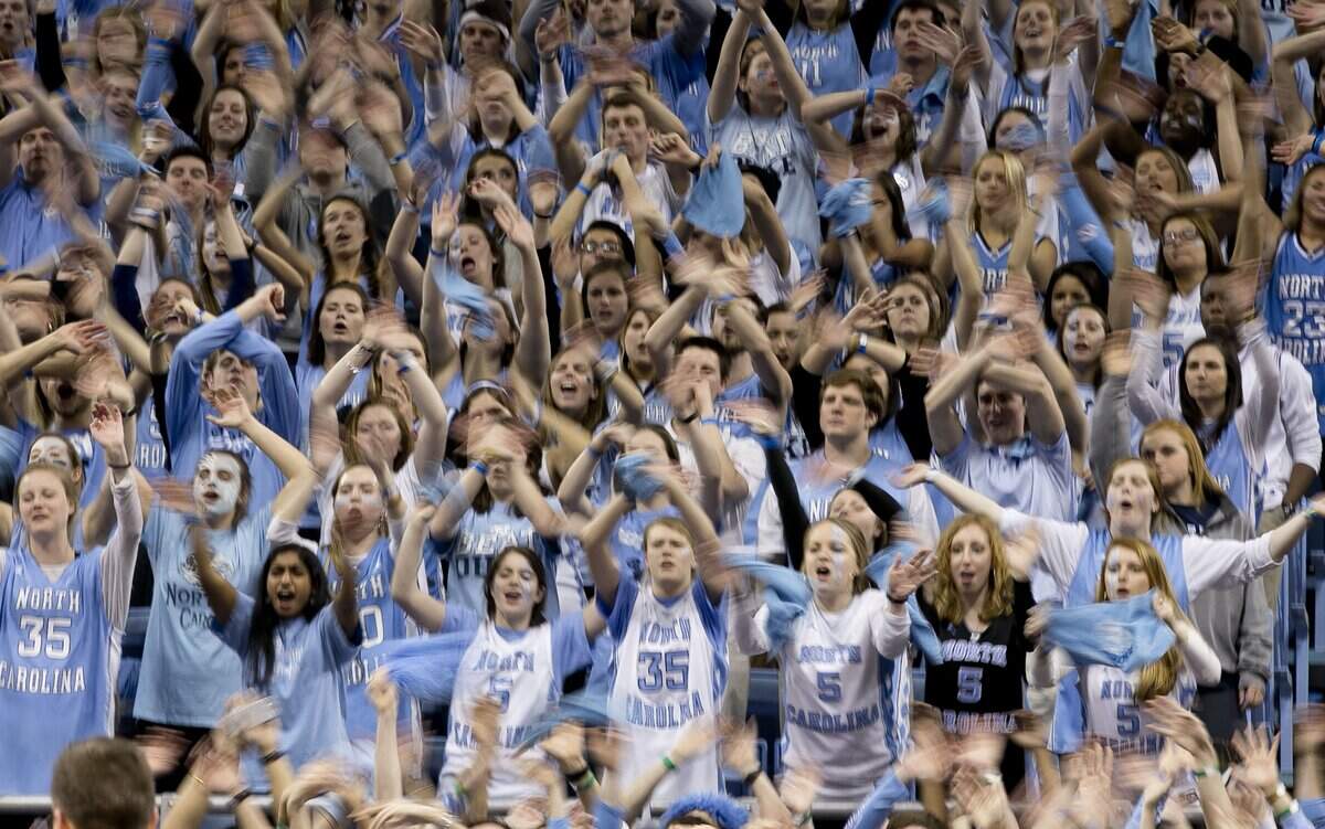 Fans in the North Carolina student section harass a Duke player at the free throw line during the first half on Wednesday, February 17, 2016 at the Smith Center in Chapel Hill.