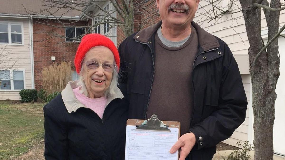 Reba Bowser and her son, Ed, after he helped her fill out her voter registration application in Asheville. But she was turned away from the Asheville DMV office on Monday when she applied for the photo ID she'll need in order to vote in the March 15 primary.