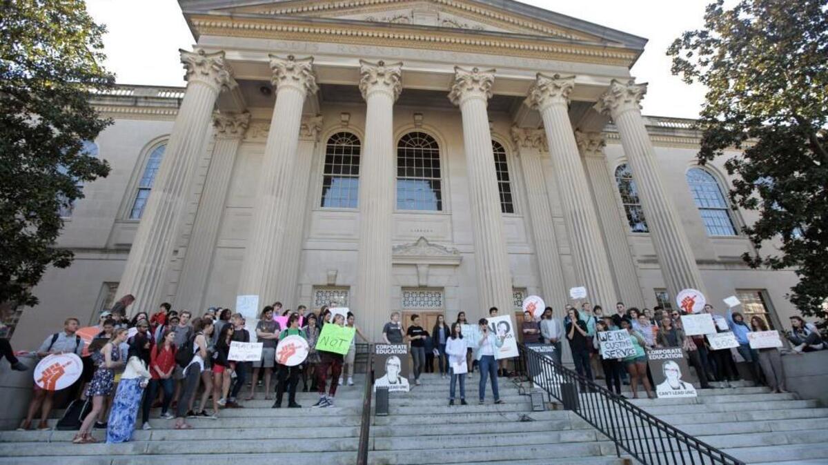 UNC student protest speakers took turns speaking out against the hiring of new UNC system president Margaret Spellings during on the steps of Wilson Library during a UNC-CH student/staff/faculty walkout protest on the Chapel Hill campus on March 1, 2016.