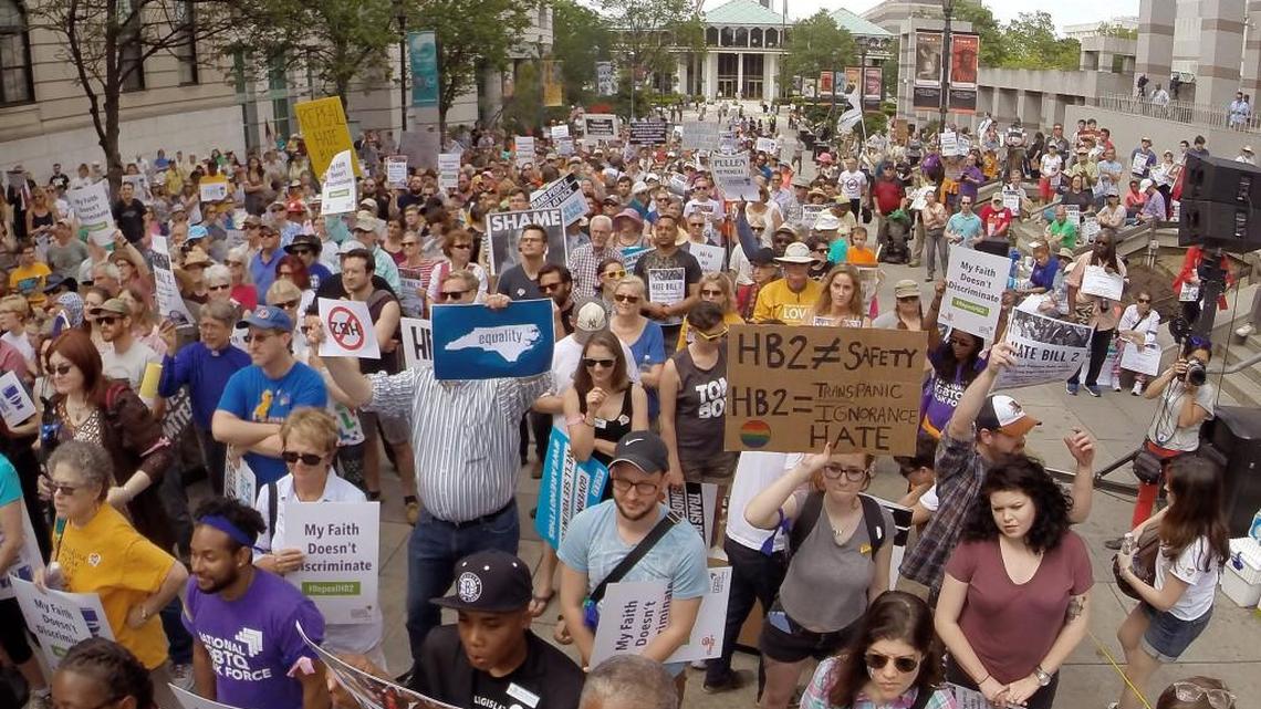 Several hundred supporters from the Moral Monday group crowd the Bicentennial Mall in support of repealing HB2 in Raleigh on April 25.