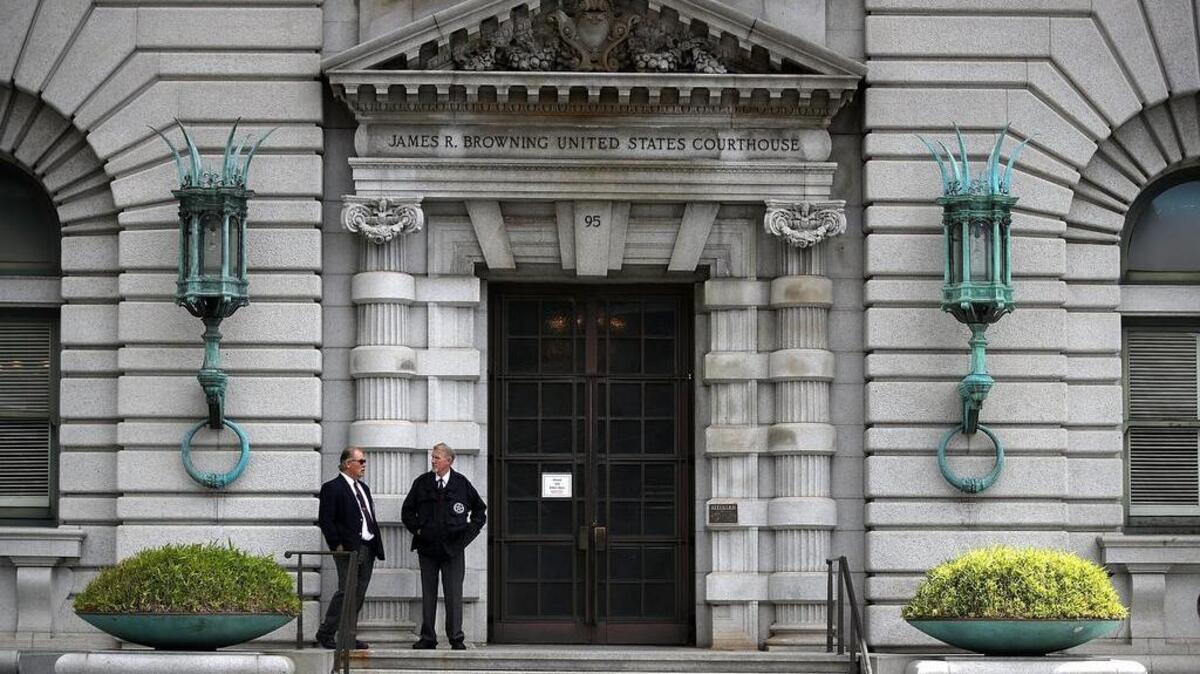Security guards stand in front of the Ninth U.S. Circuit Court of Appeals on June 12 in San Francisco, California. A ruling from a three-judge panel of the Ninth Circuit Court of Appeals has ruled against U.S. President Donald Trump’s revised executive order limiting travel from six predominately Muslim countries.