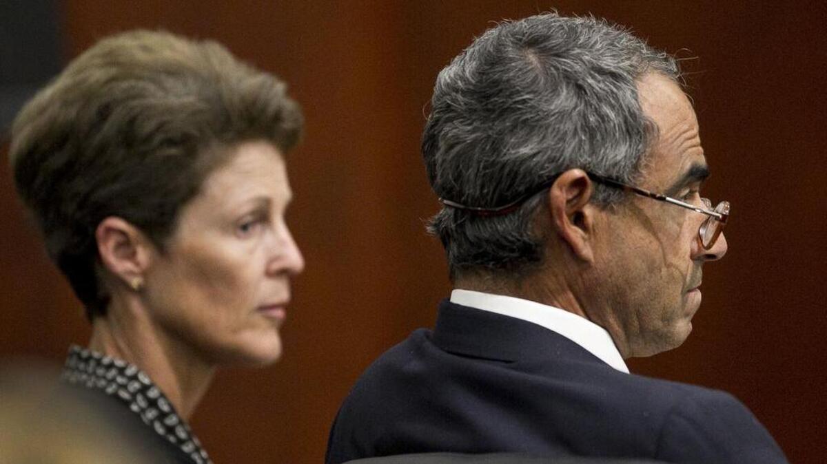 
Dr. Charles Matthews and his wife Kimberley Matthews listen to testimony during their trial on July 28, 2015 at the Wake County Justice Center in Raleigh, N.C. They are accused of aiding underage drinking. Jonathon Gregory Taylor died in a car crash after attending a wedding at the Matthews’ home in June 2014. 
