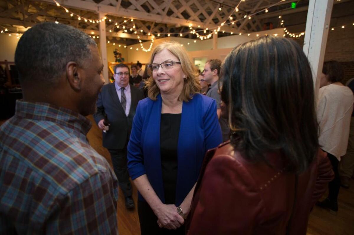 Raleigh Mayor Nancy McFarlane talks with supporters following her victory over challenger Charles Francis during an election night gathering at the Stockroom on Tuesday, November 7, 2017 in Raleigh, N.C.