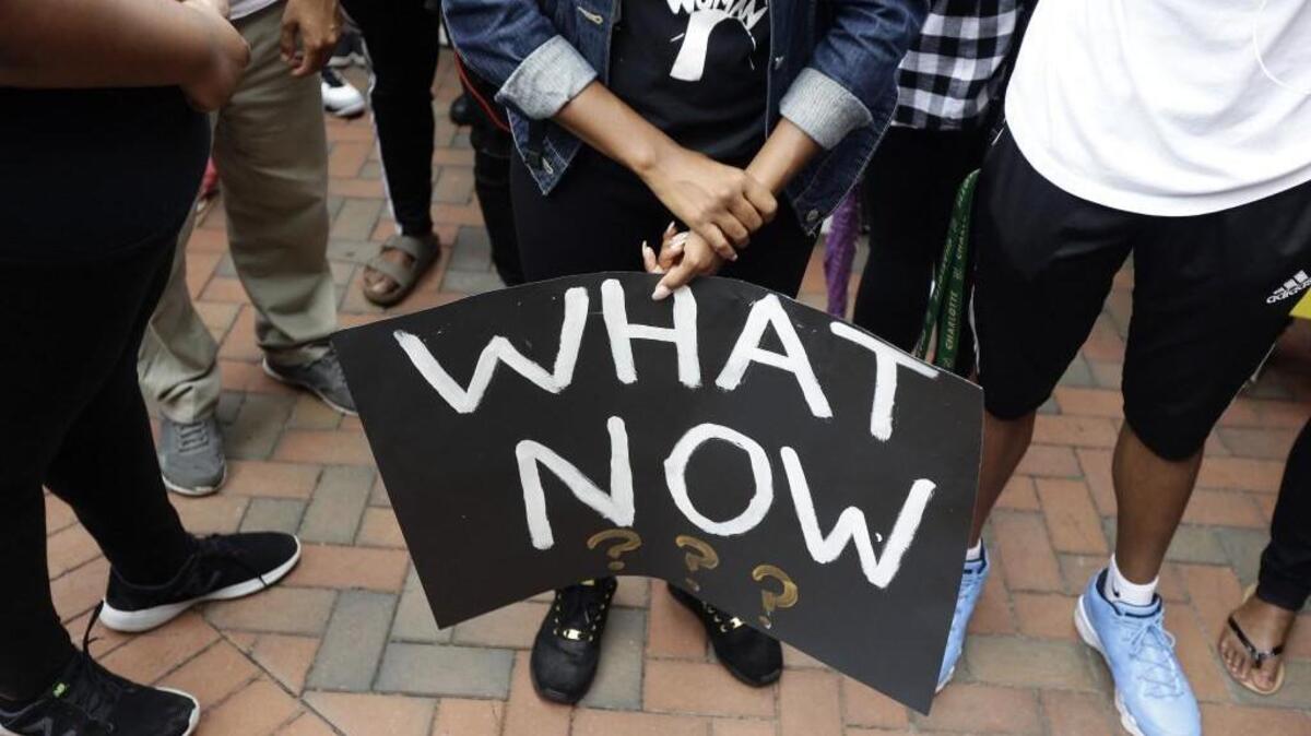 Students at the University of North Carolina Charlotte held a vigil the day after the Sept. 20 police shooting of Keith Lamont Scott at a Charlotte apartment complex.