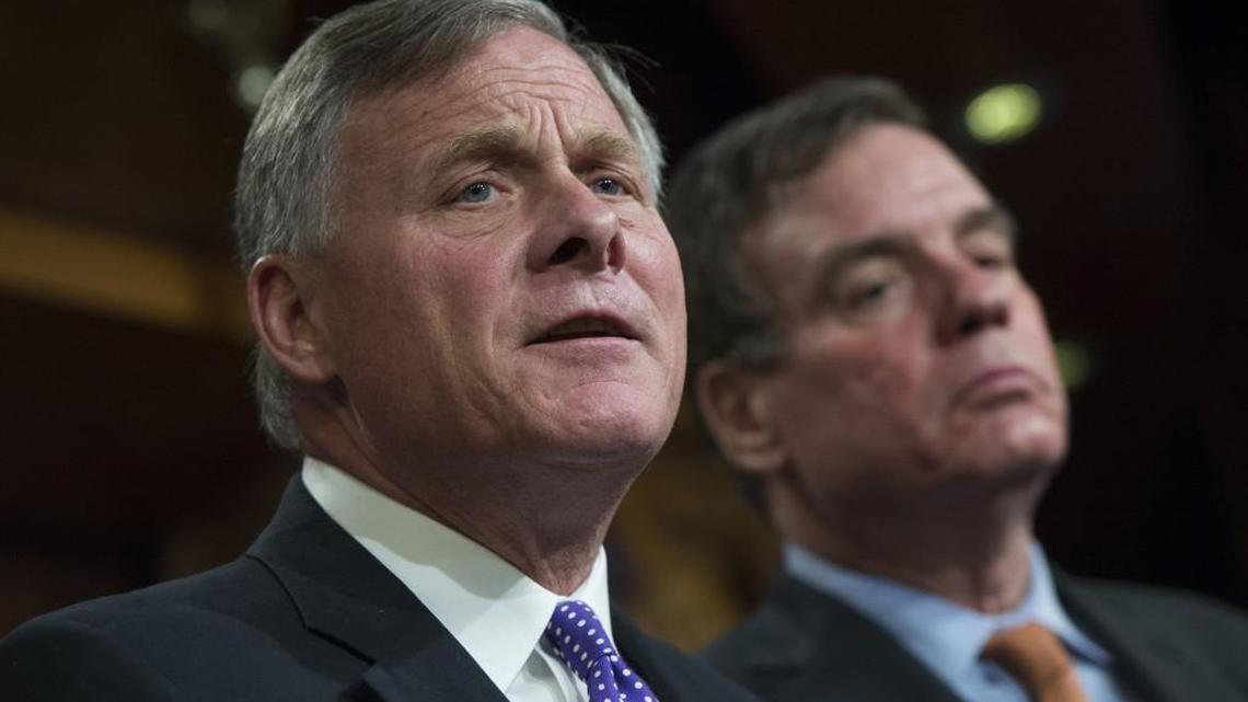 Senate Intelligence Committee Chairman Richard Burr (R-N.C.), left, and Vice Chair Mark Warner (D-Va.) conduct a news conference on October 4, 2017, in the Capitol.