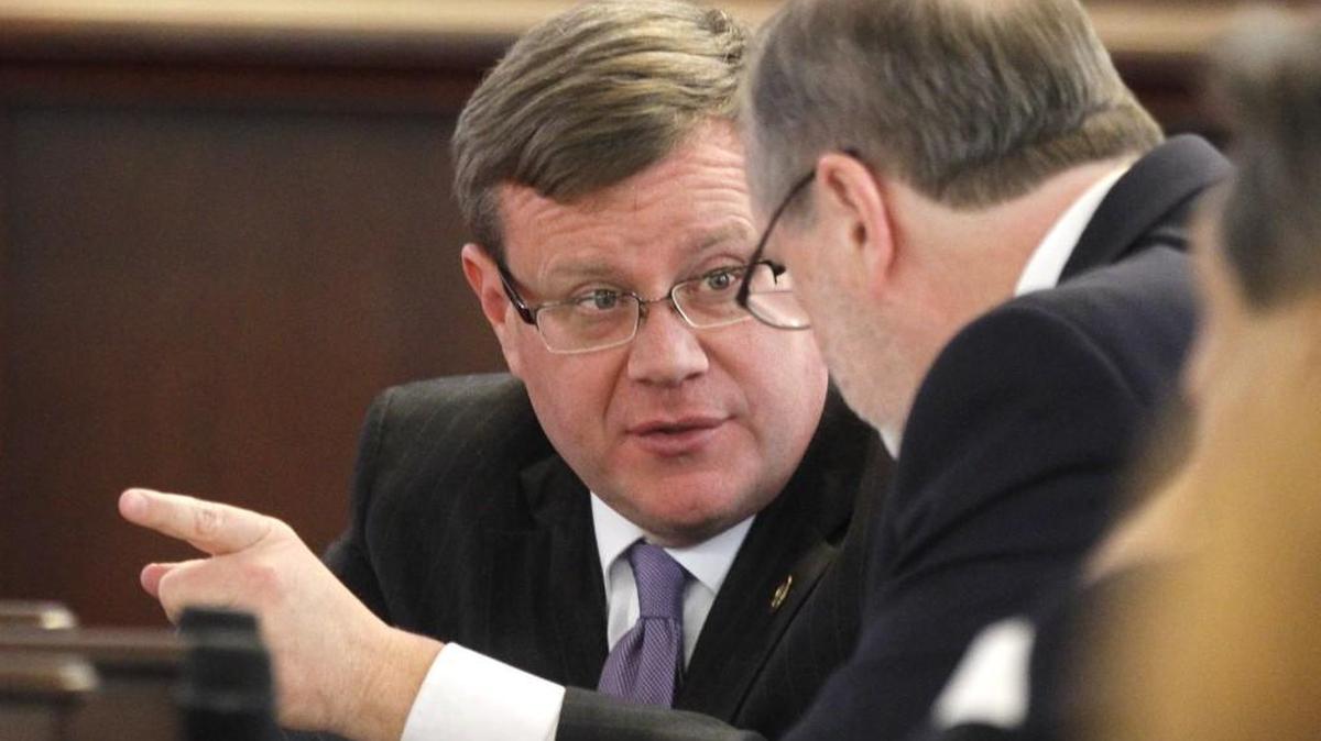 Tim Moore, Speaker of the House, left, confers with Phil Berger, President Pro Tempore, in the Senate chambers during a special session in December. Republican leaders are bringing back a bill that failed last session that calls for the state income tax to be capped at 5.5 percent by a constitutional amendment.
