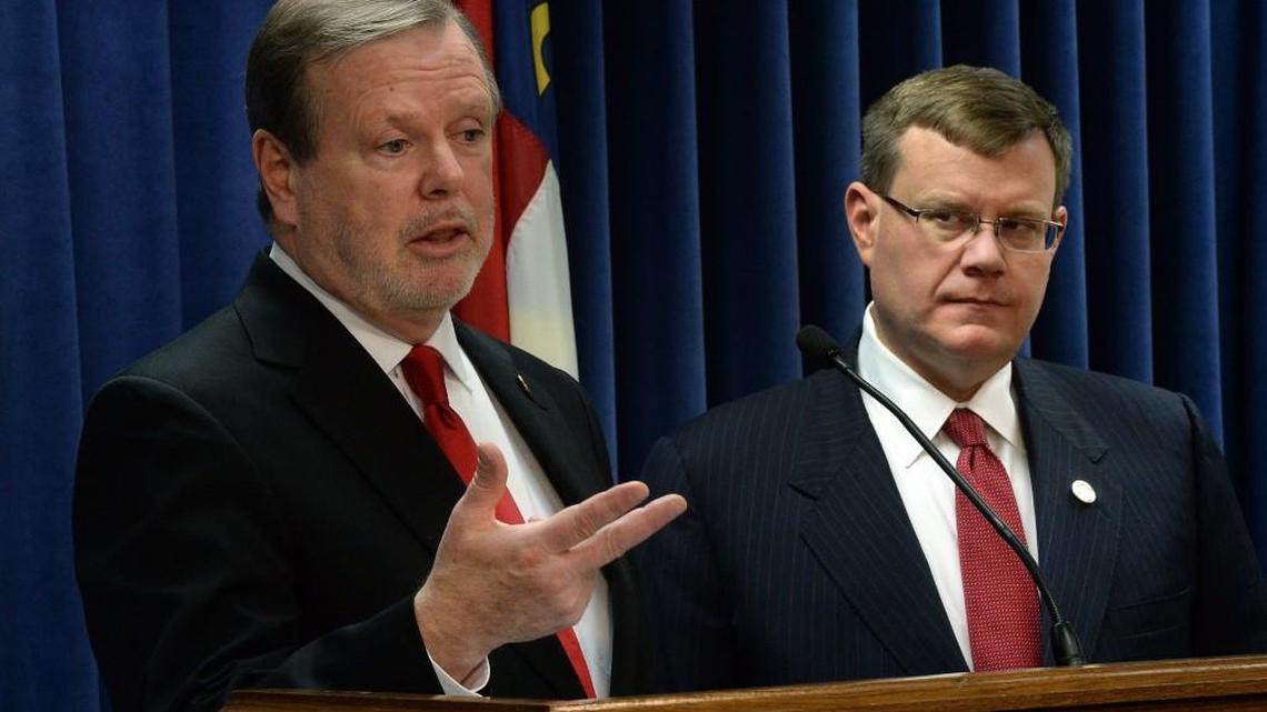 Sen. Phil Berger (R), President Pro Tempore of the N.C. Senate, left, and Rep. Tim Moore (R), Speaker of the House are touting a budget surplus, but are committed to spending the extra dollars on tax cuts instead of supporting state programs and raising state salaries.