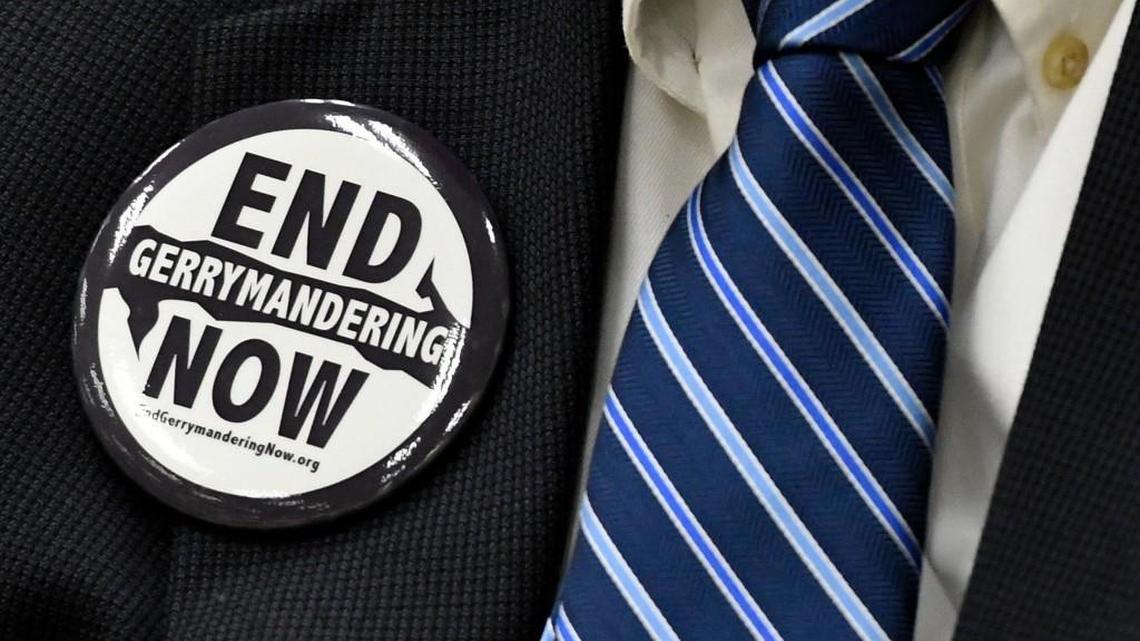 A man sports a button against gerrymandering as a crowd of over 100 members of the public who attended a People's Hearing on HB200 at the Legislative Office Building in Raleigh, N.C. Monday, June 5, 2017. Sponsored by Common Cause, dozens of voters spoke out in support of HB200 which would establish a nonpartisan way of drawing the state's voting maps, free from party politics.