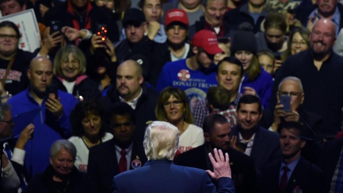 President-elect Donald Trump greets the audience during the USA Thank You Tour at the US Bank Arena in Cincinnati, Ohio on December 1.