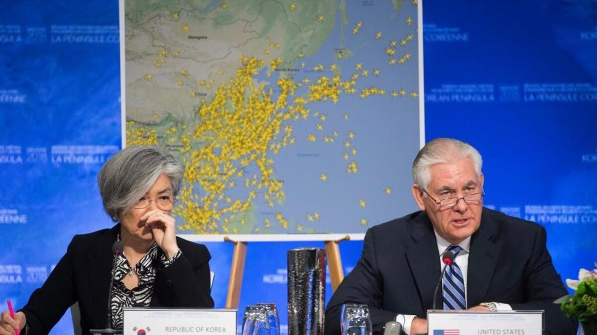 United States Secretary of State Rex Tillerson speaks as South Korean Foreign Minister Kang Kyung-wha, sits at left, during a meeting on North Korea in Vancouver, British Columbia, Tuesday, Jan. 16, 2018. Officials are discussing sanctions, preventing the spread of weapons and diplomatic options.