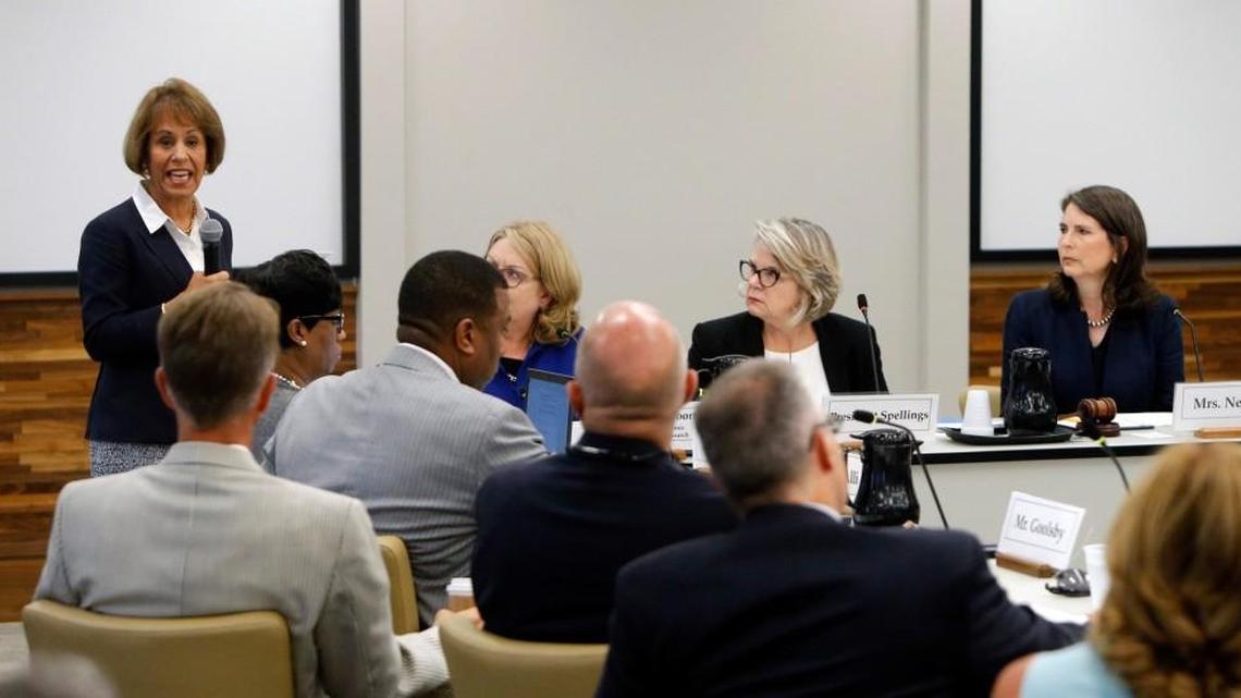 UNC-CH Chancellor Carol Folt, left, speaks before the UNC Board of Governors Committee on Educational Planning, Policies and Programs discusses a proposal to ban litigation for academic centers during a meeting held in Chapel Hill on August 1, 2017. UNC system president Margaret Spellings, second from right, and committee Chair Anna Nelson, right, listen. About 50 protestors gathered before the meeting and went in to the meeting to listen to proceedings.