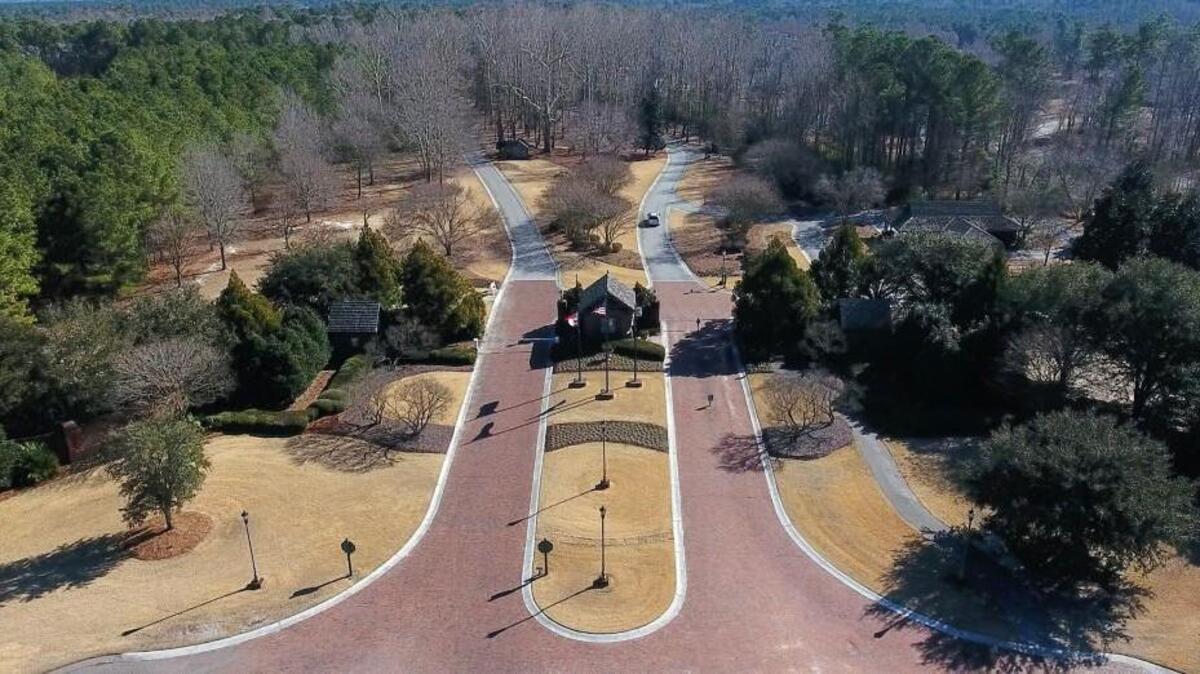 Rep. Jimmy Dixon stuck $830,000 quietly into the state budget last spring to build a new sewer line and upgrade a sewer pump station at the River Landing gated community in Wallace. The money will allow Wendell Murphy’s family to expand the Holiday Inn Express and also allow more homes to be built at River Landing.
