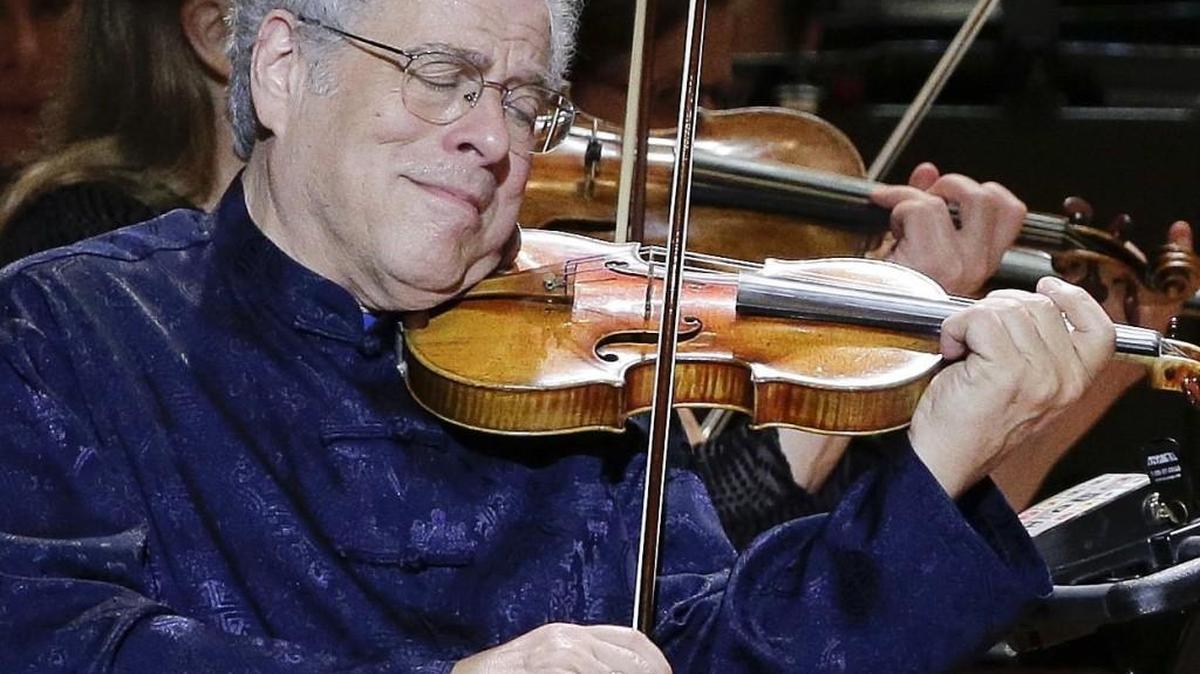 Itzhak Perlman, on violin during Carnegie Hall's 125th Anniversary Concert earlier this month, canceled his Raleigh concert to protest House Bill 2. (AP Photo/Julie Jacobson)