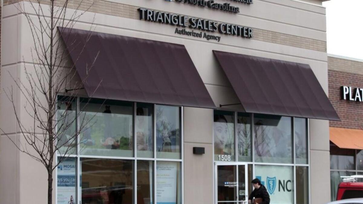 A client enters the Blue Cross Blue Shield of North Carolina Triangle Sales Center in the Village Market Place shopping center in Morrisville. The insurance company was fined a record $3.6 million for technology problems that botched coverage, billing and payments for thousands of customers and doctors.