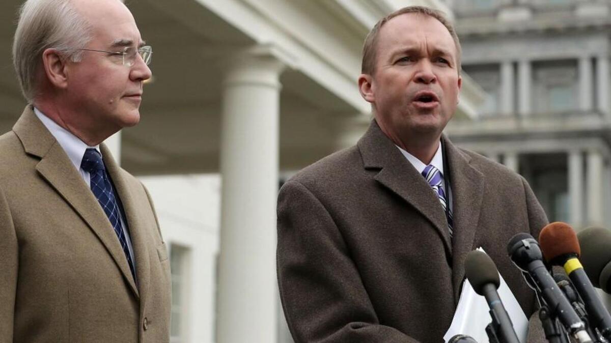 U.S. Health and Human Services Secretary Tom Price (L) and Office of Management and Budget Director Mick Mulvaney talk to reporters following the release of the Congressional Budget Office report on the proposed American Health Care Act outside the White House West Wing March 13, 2017 in Washington, DC. Price said “we disagree strenuously” with the findings of the CBO report about the Republican’s attempt to repeal and replace the Affordable Care Act, or Obamacare.