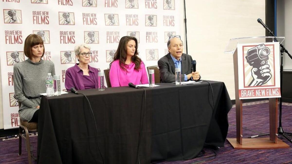 (L-R) Rachel Crooks, Jessica Leeds, Samantha Holvey and founder and president of Brave New Films Robert Greenwald speak during the press conference held by women accusing Trump of sexual harassment in NYC on December 11, 2017 in New York City.