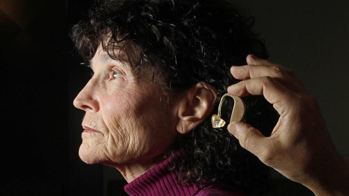 Carolyn Meyer, who has worn hearing aids for decades, is an outreach coordinator for the Pennsylvania Office of the Hearing Loss Association of America, a consumer group. Many are put off getting hearing aids due to high costs. (Michael Bryant/Philadelphia Inquirer/MCT)