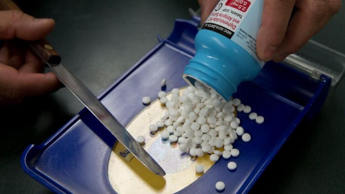 In this Friday, July 8, 2016, file photo, a pharmacy technician fills a prescription for an anti-diarrhea medication at a pharmacy, in Sacramento, Calif. Filling a prescription is no longer the simple errand you run after a doctor visit. With drug prices rising and insurance coverage shrinking, it pays to ask questions and do a little research before handing over your insurance card at the pharmacy counter. Having coverage offers no guarantee that you’re getting the best price for your medicine.