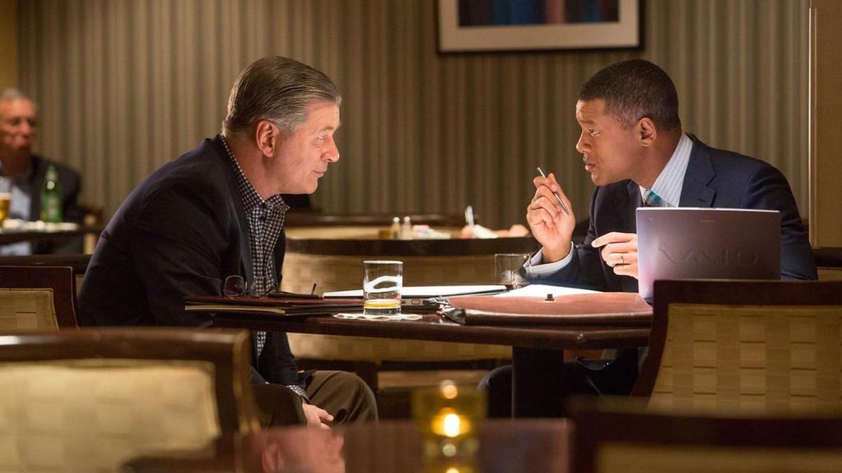 Alec Baldwin stars as Dr. Julian Bailes and Will Smith stars as Dr. Bennet Omalu in Columbia Pictures' “Concussion.”
