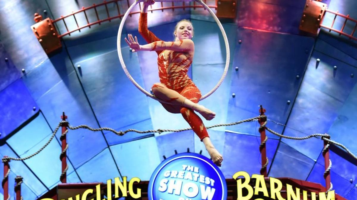 Aerialist Olha Peresada performs during the pre show before the Ringling Bros. and Barnum & Bailey Circus begins at the Veterans Memorial Arena Thursday evening, Jan. 19, 2017, in Jacksonville, Fla. The circus, which came through Raleigh last week, is closing in May 2017.