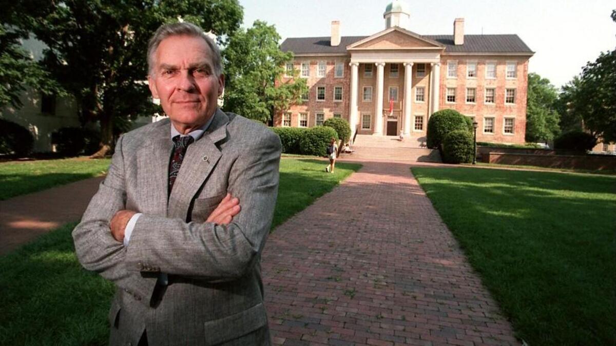 UNC-CH Chancellor Paul Hardin outside South Building on campus in June 1995 shortly before he stepped down after seven years of leading the university. He died on July 1 at 86. Current chancellor Carol L. Folt said, “Chancellor Paul Hardin was a visionary leader who is remembered in North Carolina and across our nation for his dedication to promoting the life-changing impact and benefits of higher education.” C.STAFF PHOTO JIM BOUNDS