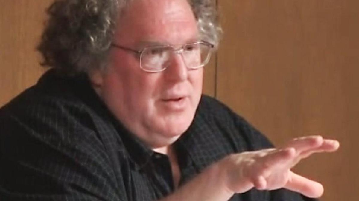 State toxicologist Dr. Ken Rudo, pictured here in a Canary Coalition video taken at a 2014 public meeting in Cashiers, says he felt pressured to weaken do-not-drink warnings about well water near Duke Energy’s coal ash storage sites.